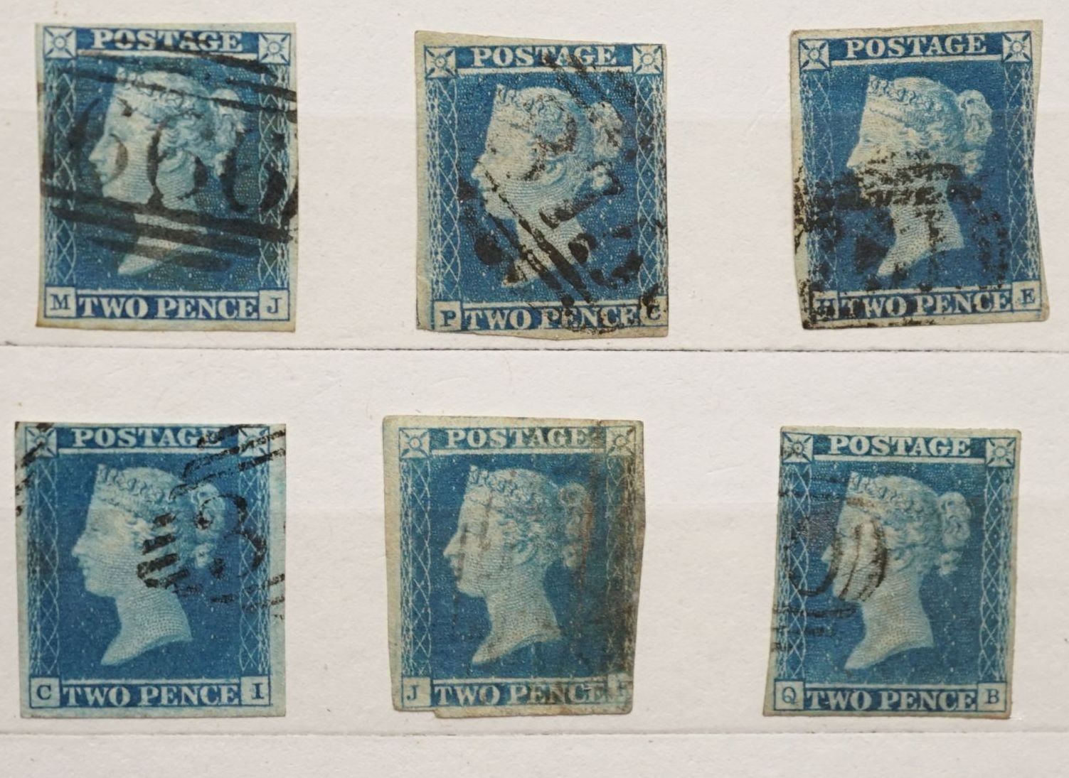 Great Britain - small stock book 2d blues with 1841 2d used strip of three, 6 singles used. 1858 2d plate 13 and plate 14 mint blocks of four